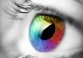 Black and White picture with a multi-colored eye